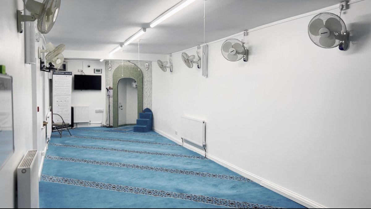 People gathering in a mosque for community worship