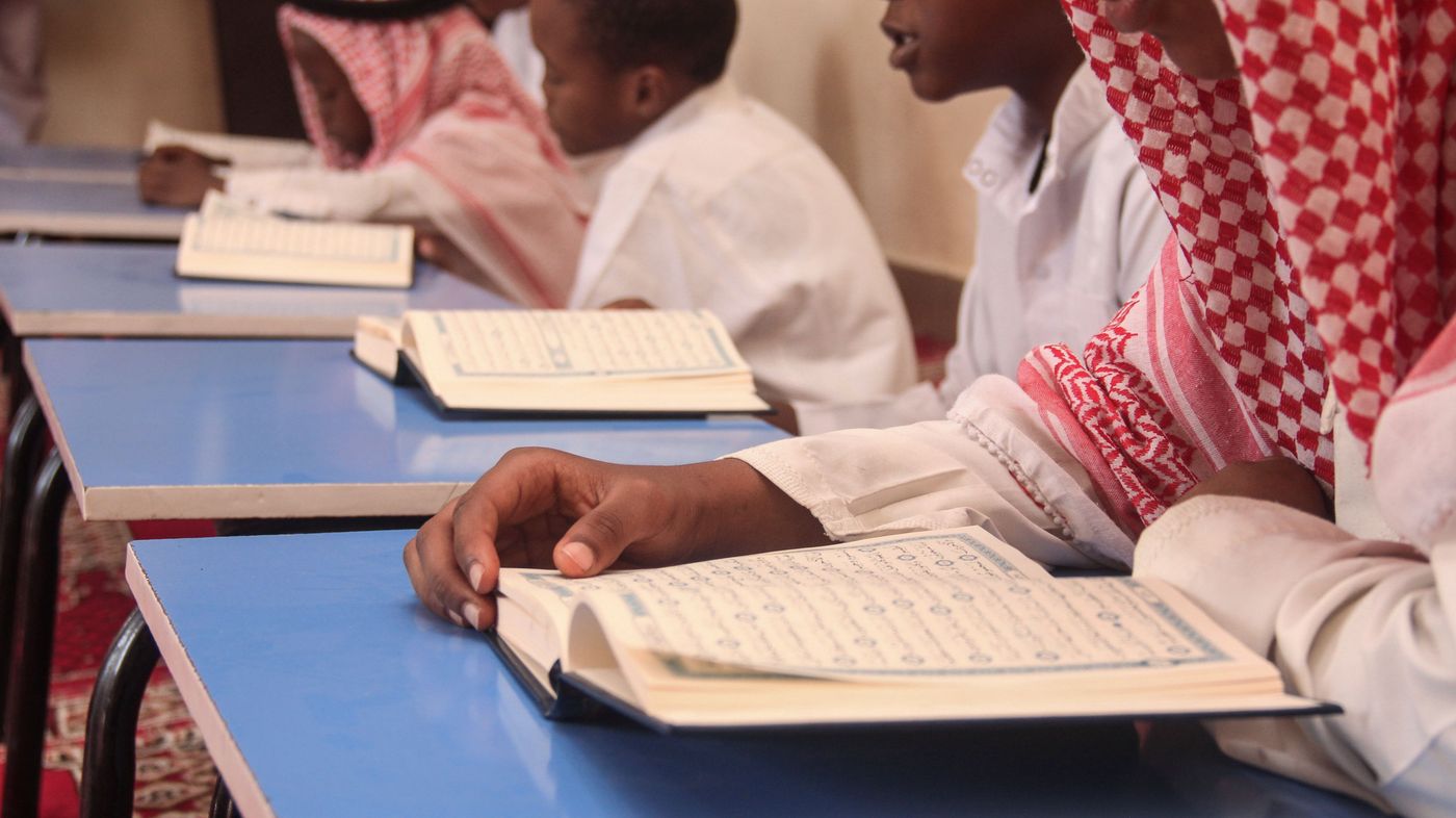Children learning Qur’an together in class
